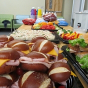 An assortment of sandwiches and finger foods were provided to the audience.