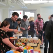 Guests partake in the luncheon provided by the Aurora staff.