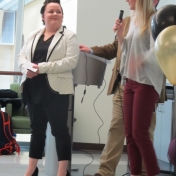 Marissa Massey (left) and Cayla Robinson (right) welcome guests to the party.